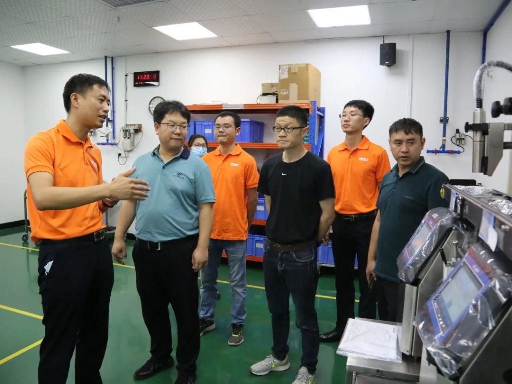 企业考察 | 新希望乳业高层团队到依玛进行考察交流